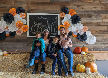 Judge Rania, her husband, and their three children pose for a family photo in Fall 2022.
